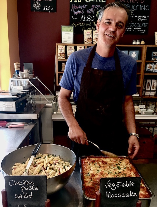 Fabrizio Fiaschi, owner, serving food.